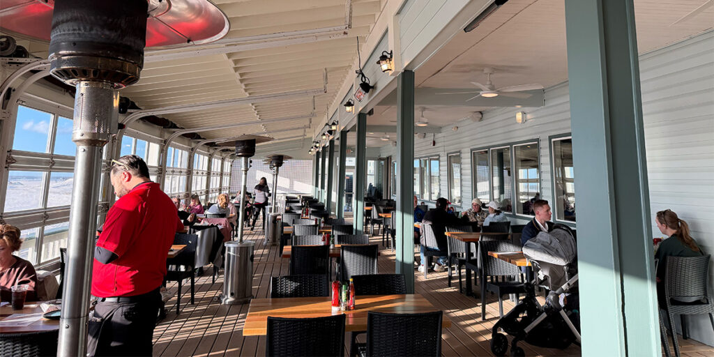 Crabby's Beachside Pavilion - patio seating area